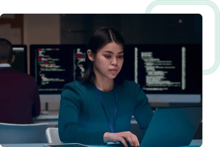 Cybersecurity consultant works on security requirements for urban data platforms at the computer